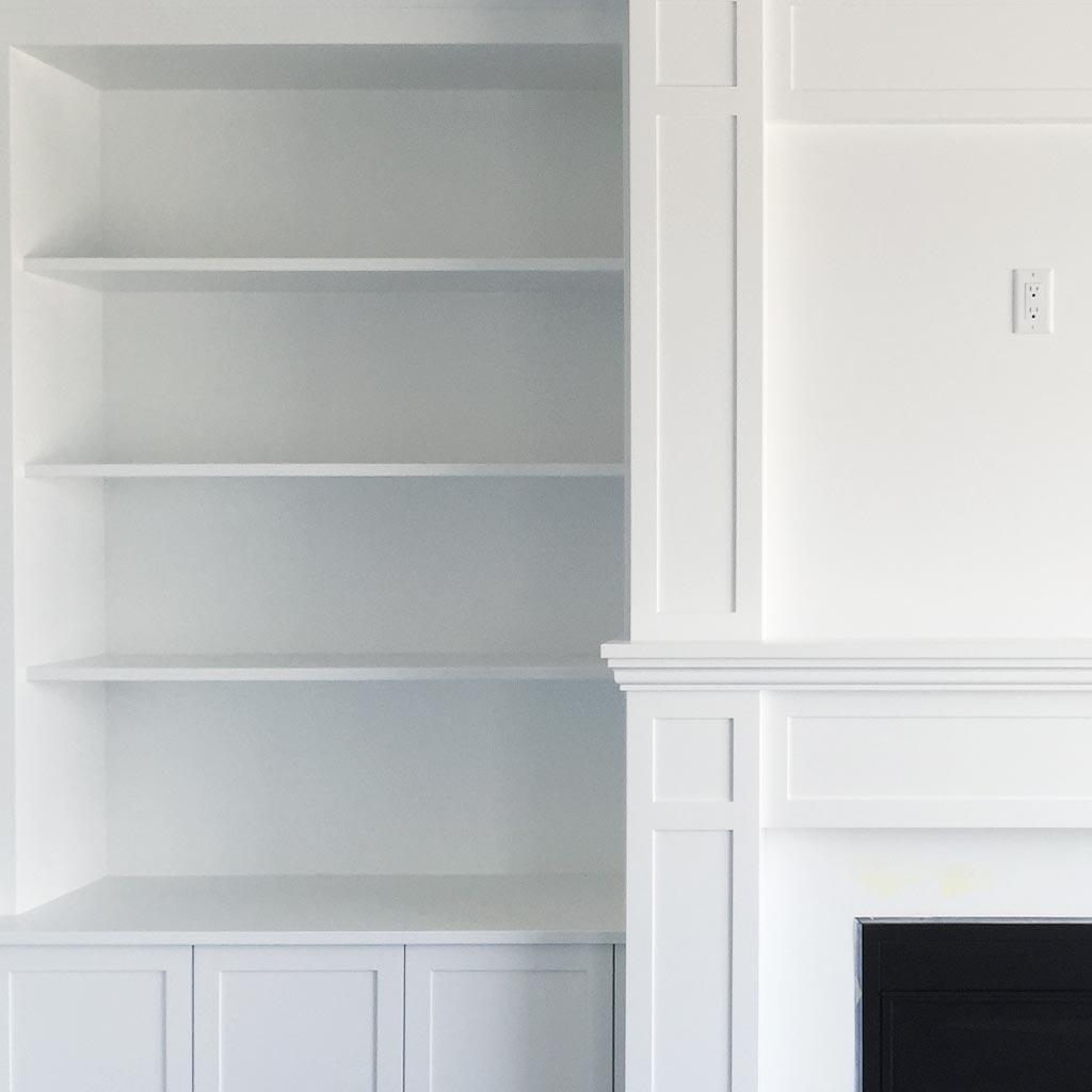 kings-contracting-finishing-carpentry-trim-saskatoon-FEATURE-06 Saskatoon custom built fire place shelving feature wall